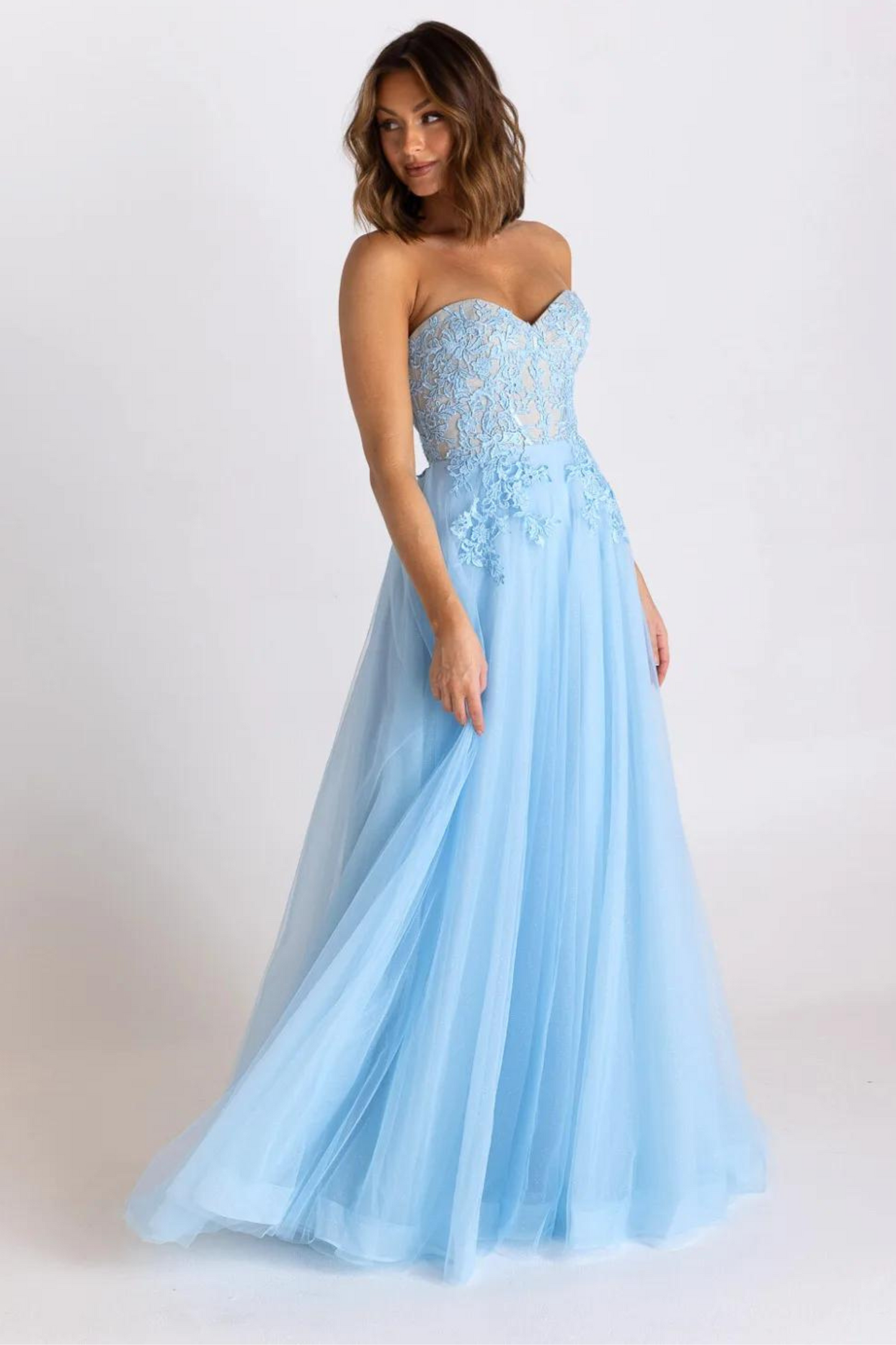 Tania Olsen a-line formal dress with embroidered lace bodice and tulle and glitter skirt in pale blue