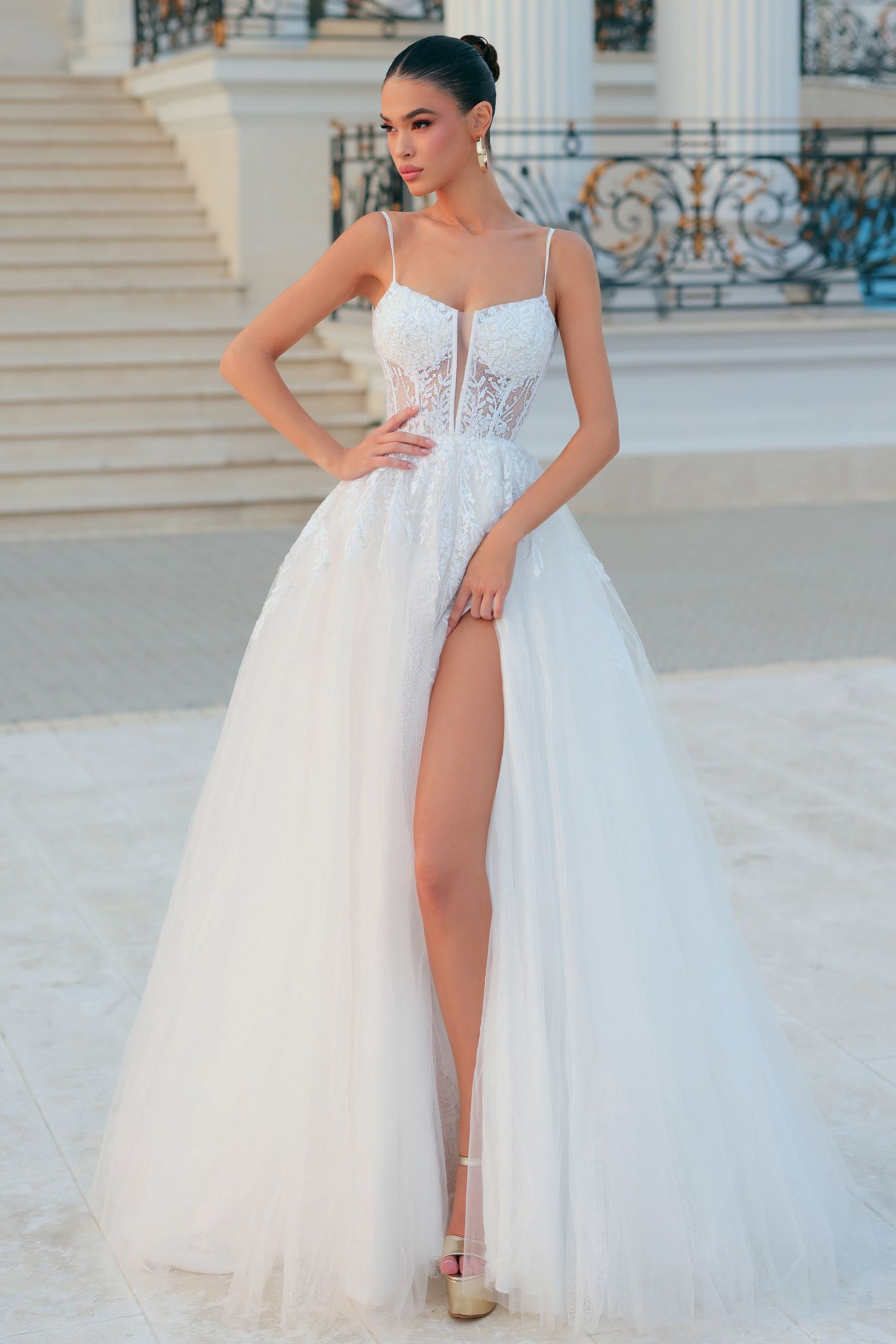 Tina Holly wedding dress with corseted lace bodice and attached overskirt with train in off white glitter tulle